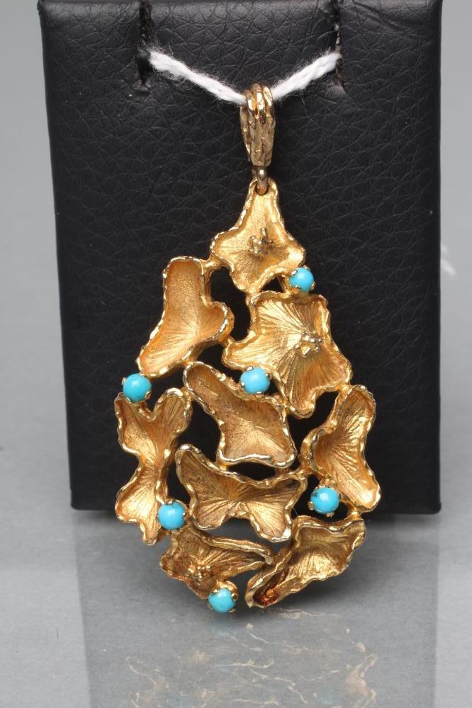 A MODERNIST ABSTRACT PENDANT of open tear drop form claw set with six turquoise beads Image