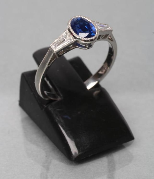 A CEYLON SAPPHIRE AND DIAMOND RING Image