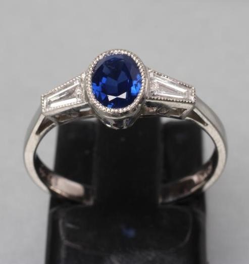 A CEYLON SAPPHIRE AND DIAMOND RING Image