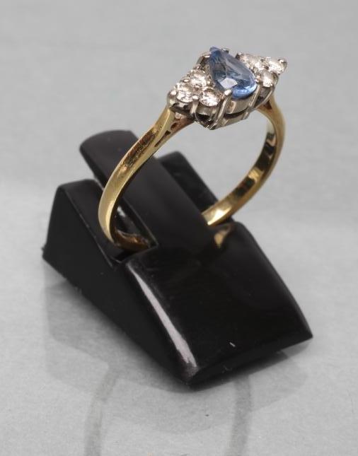 A THREE STONE SAPPHIRE AND DIAMOND RING Image