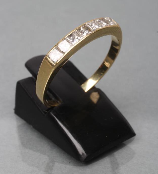 A DIAMOND HALF HOOP ETERNITY RING Image
