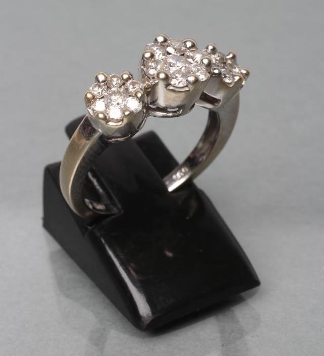 A DIAMOND TRIPLE CLUSTER RING Image