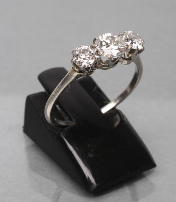 A THREE STONE DIAMOND RING Image