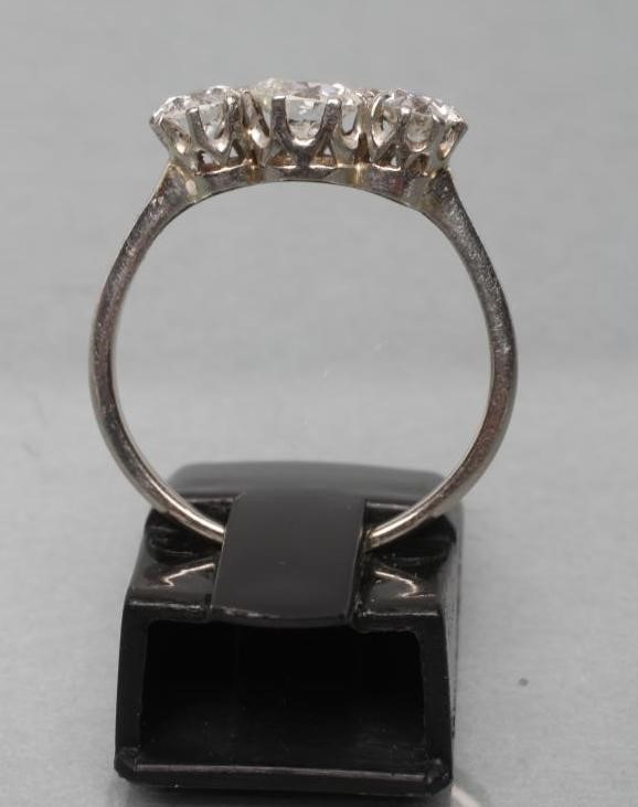 A THREE STONE DIAMOND RING Image