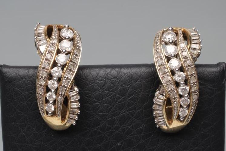 A PAIR OF DIAMOND EARRINGS Image