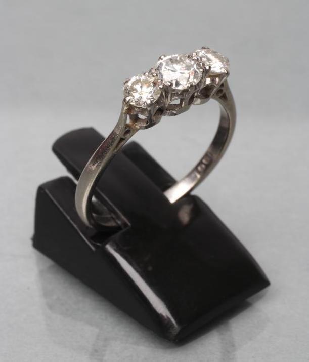 A THREE STONE DIAMOND RING Image