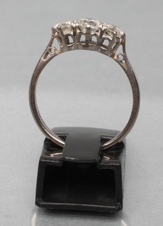 A THREE STONE DIAMOND RING Image