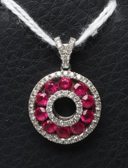 A RUBY AND DIAMOND "DOUGHNUT" PENDANT Image