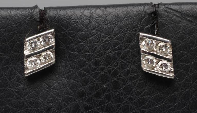 A PAIR OF DIAMOND EAR STUDS Image