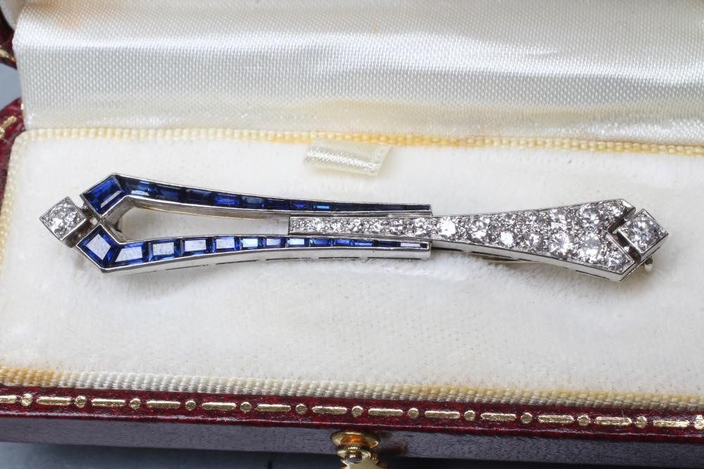 AN ART DECO SAPPHIRE AND DIAMOND BROOCH Image