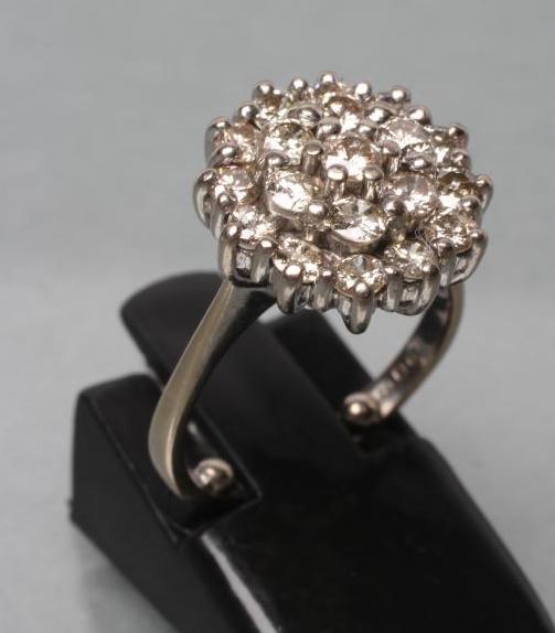 A DIAMOND CLUSTER RING Image