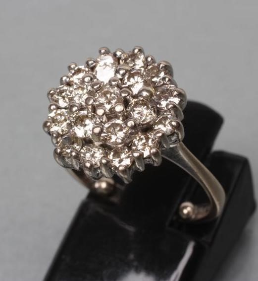 A DIAMOND CLUSTER RING Image