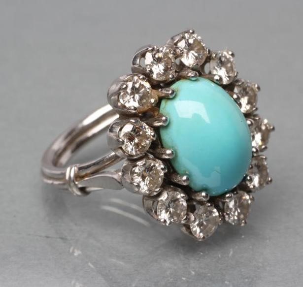 A TURQUOISE AND DIAMOND CLUSTER RING Image