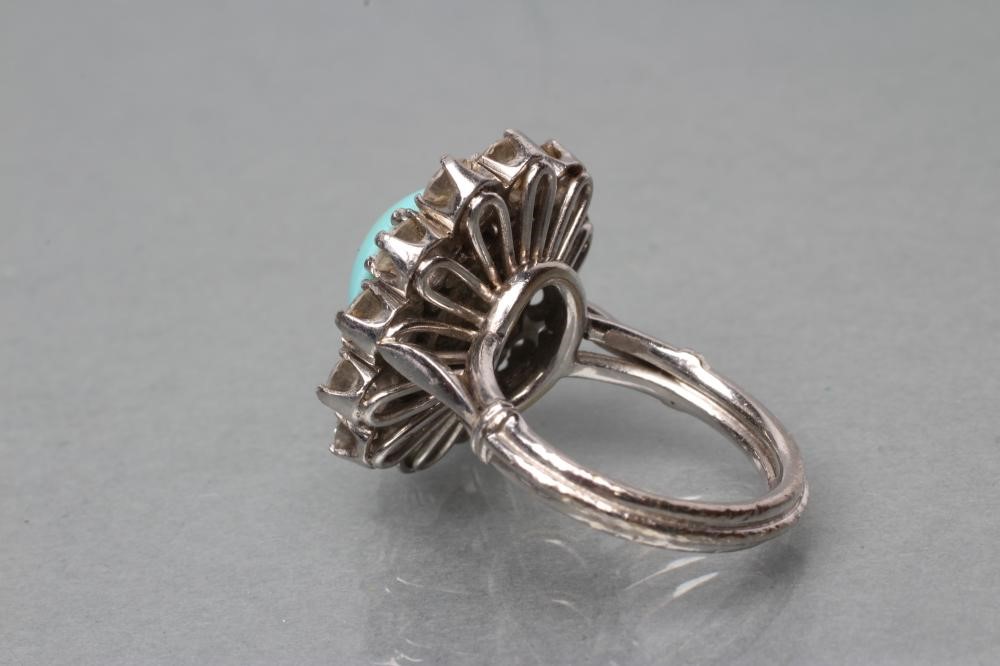 A TURQUOISE AND DIAMOND CLUSTER RING Image