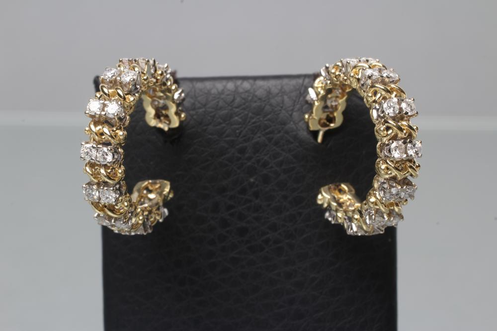 A PAIR OF DIAMOND HOOP EARRINGS Image