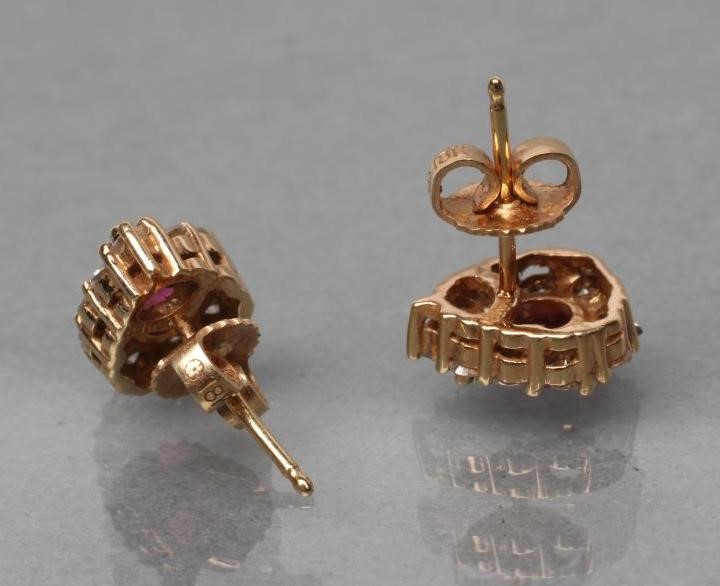 A PAIR OF RUBY AND DIAMOND EAR STUDS Image
