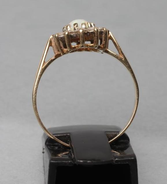 AN OPAL AND DIAMOND CLUSTER RING Image