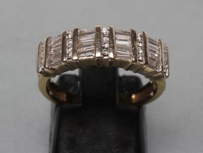A DIAMOND HALF HOOP ETERNITY RING Image