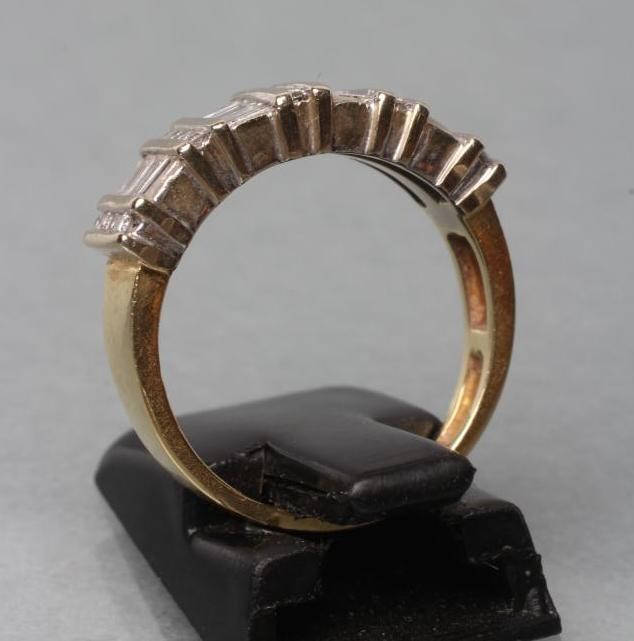 A DIAMOND HALF HOOP ETERNITY RING Image