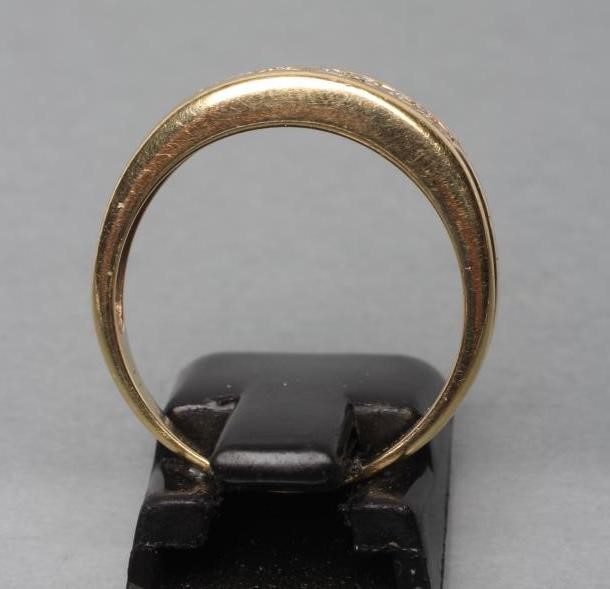 A DIAMOND HALF HOOP ETERNITY RING Image