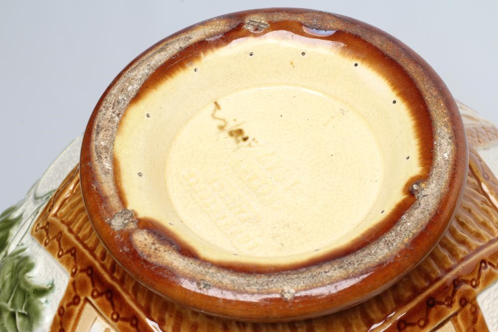 A BURMANTOFTS FAIENCE JARDINIERE AND STAND Image