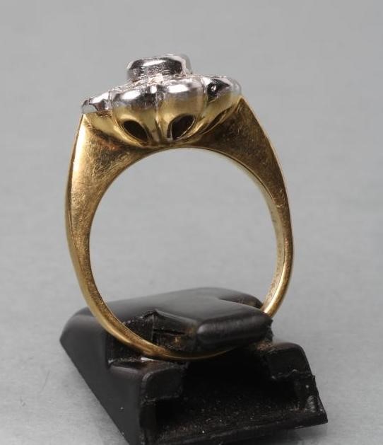 A DIAMOND CLUSTER RING Image