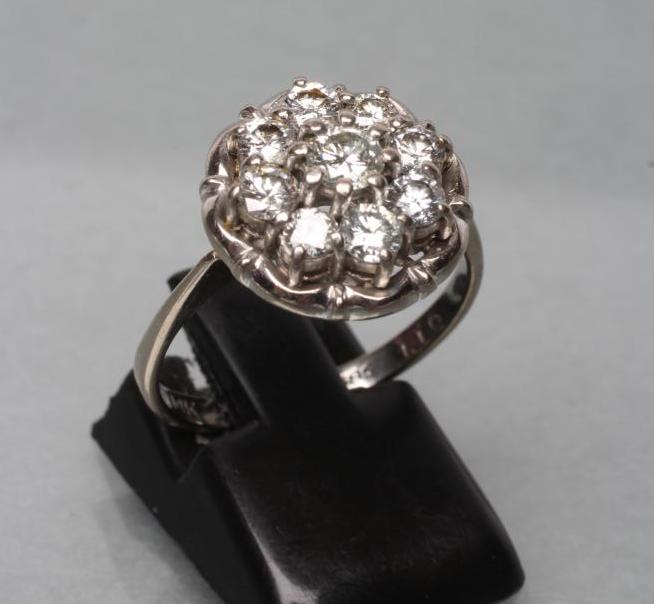A NINE STONE DIAMOND CLUSTER RING Image