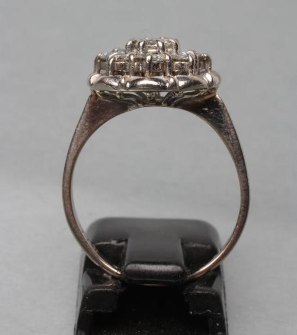 A NINE STONE DIAMOND CLUSTER RING Image