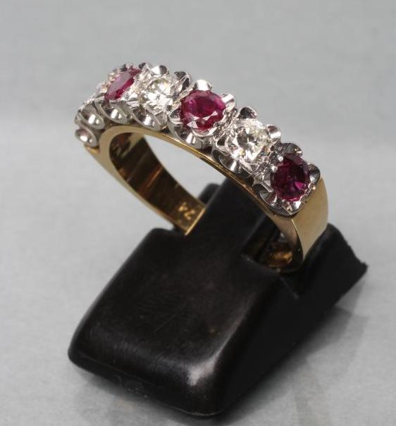 A RUBY AND DIAMOND HALF HOOP ETERNITY RING Image