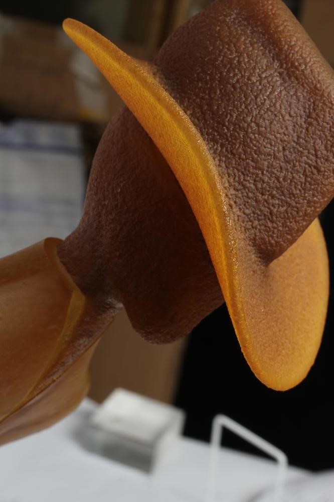 KJELL ENGMAN FOR KOSTA BODA - a large mottled amber glass figural electric table lamp base from the Image