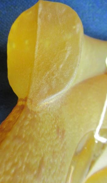 KJELL ENGMAN FOR KOSTA BODA - a large mottled amber glass figural electric table lamp base from the Image