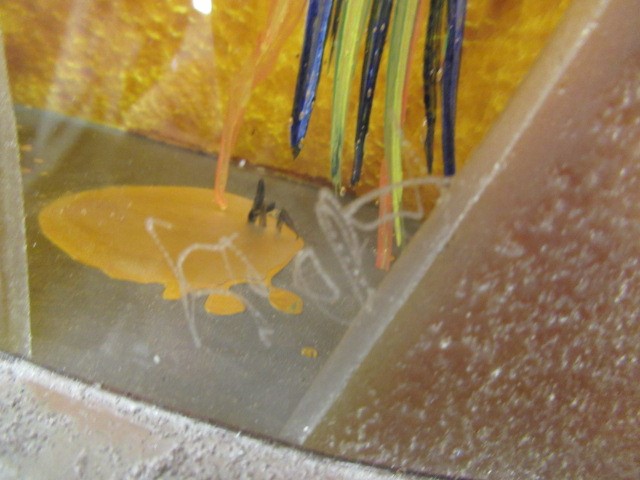 KJELL ENGMAN FOR KOSTA BODA - a large mottled amber glass figural electric table lamp base from the Image