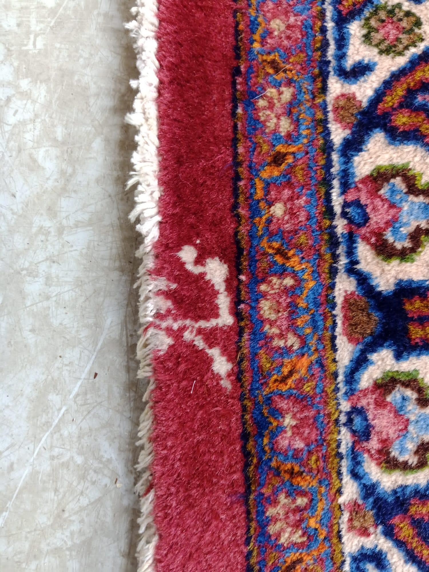 A persian carpet Hartleys Auctioneers & Valuers