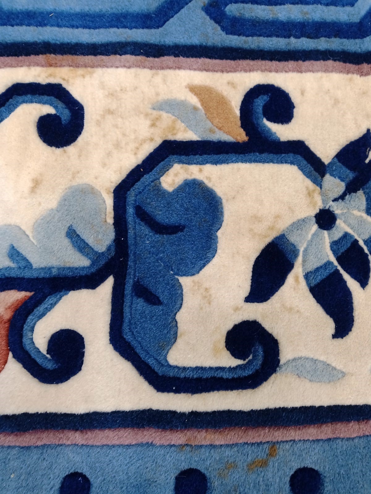 A CHINESE WASHED AND FRINGED CARPET Image