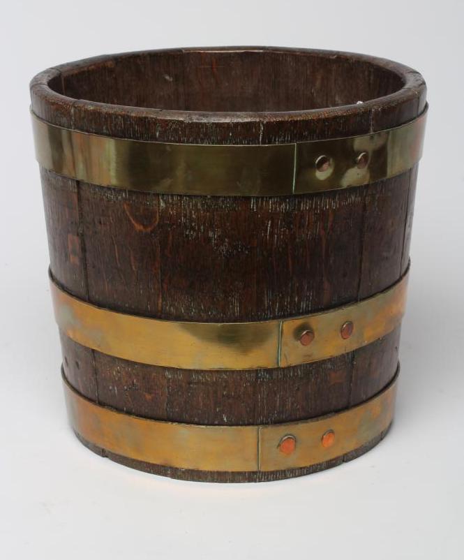 AN OAK AND BRASS BANDED JARDINIERE Image