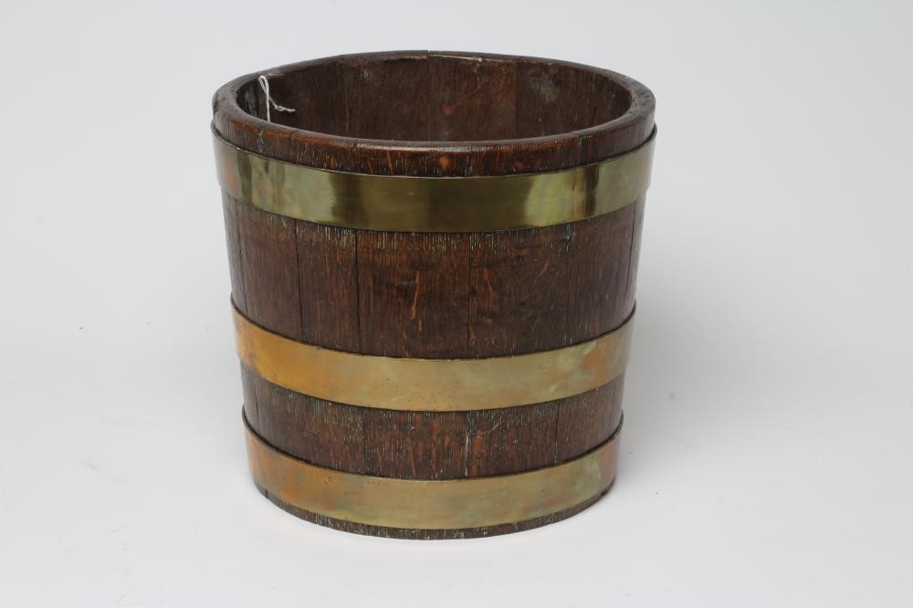 AN OAK AND BRASS BANDED JARDINIERE Image
