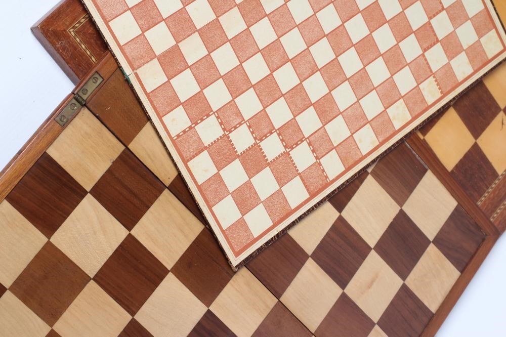 A TURNED WOOD CHESS SET in natural and stained black Image