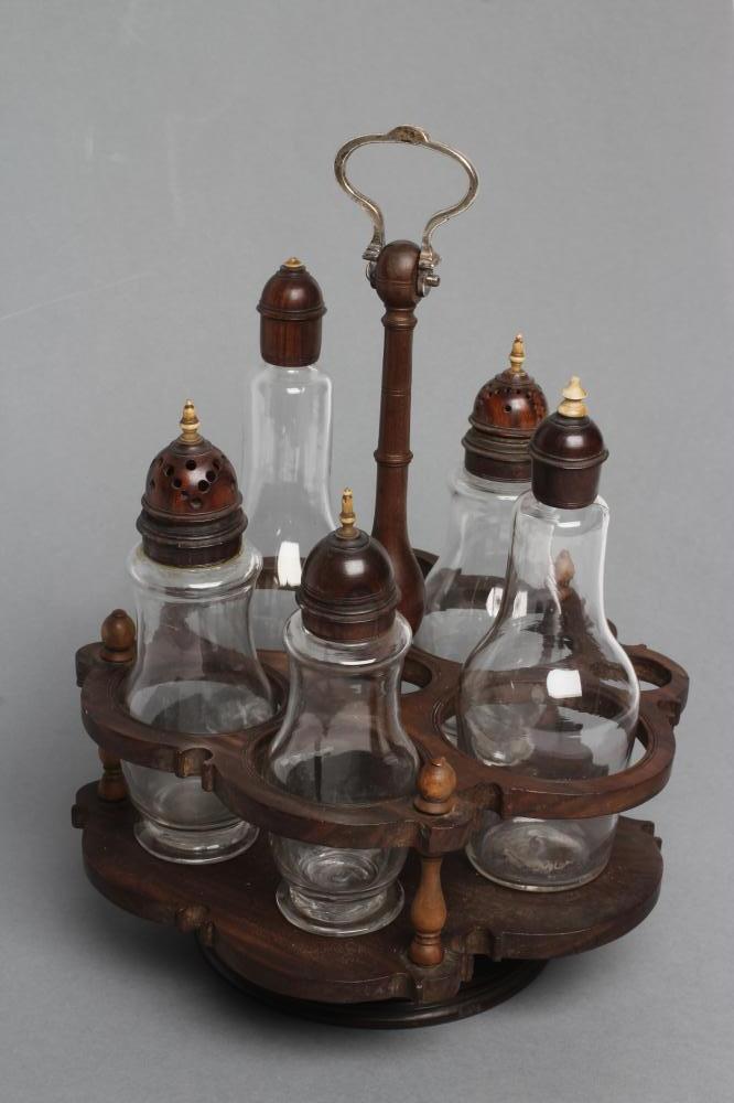 A GEORGIAN HARDWOOD FIVE BOTTLE CRUET AND STAND Image