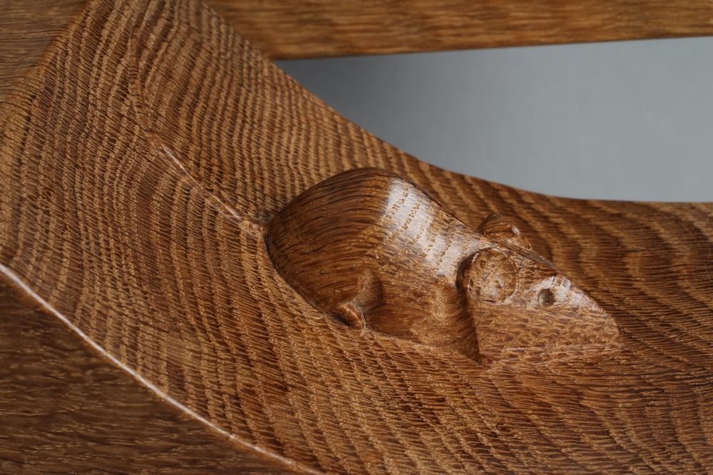 A PAIR OF ROBERT THOMPSON ADZED OAK BOOK ENDS of dished oblong form with carved mouse trademark in Image