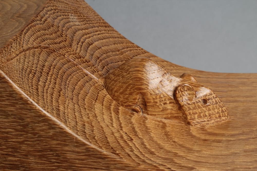 A PAIR OF ROBERT THOMPSON ADZED OAK BOOK ENDS of dished oblong form with carved mouse trademark in Image