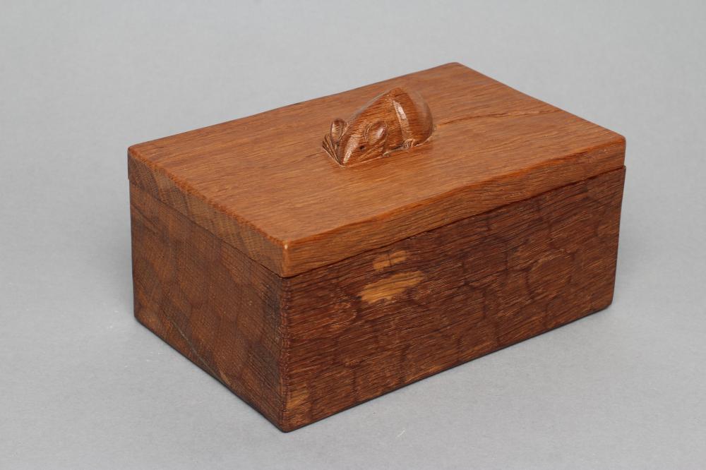 A ROBERT THOMPSON ADZED OAK TRINKET BOX of oblong form Image