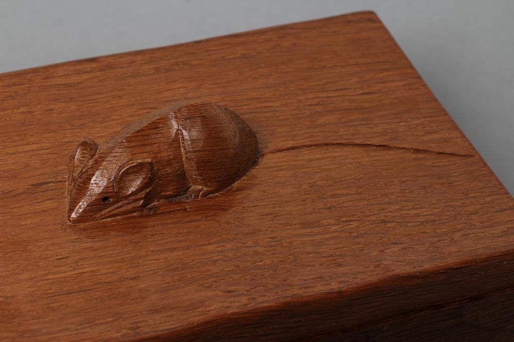 A ROBERT THOMPSON ADZED OAK TRINKET BOX of oblong form Image