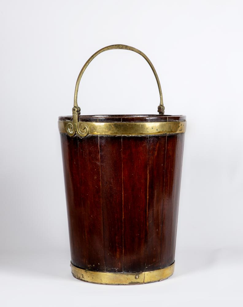 A GEORGIAN MAHOGANY AND BRASS BOUND PEAT BUCKET Image