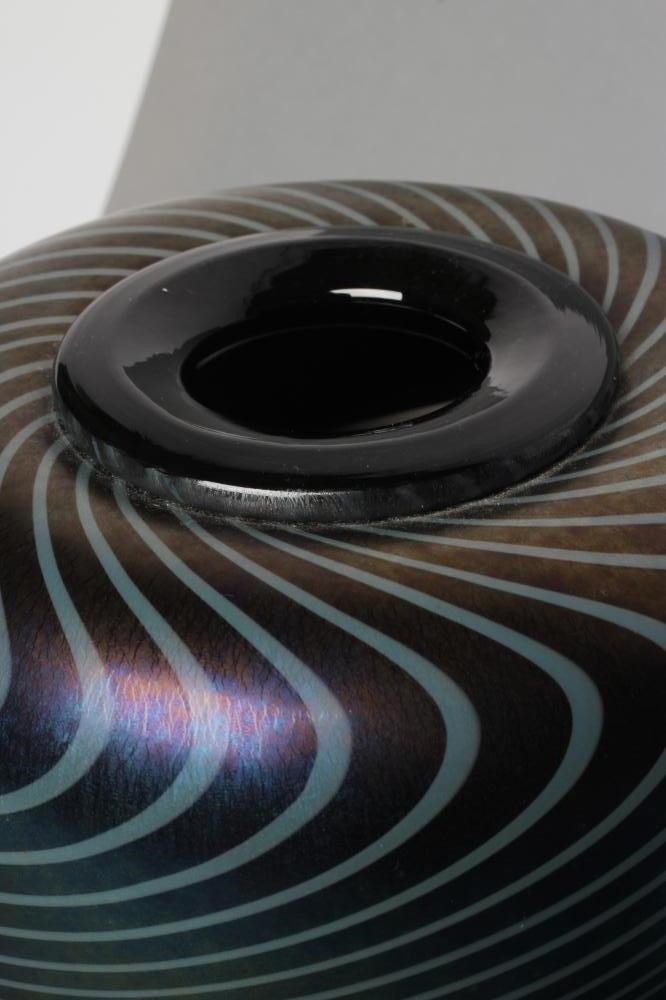 DAVID WALLACE - a peacock iridescent glass vase with swirled lines Image