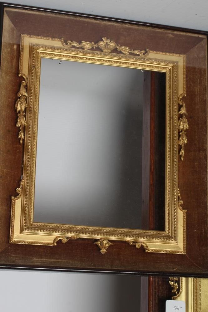A VICTORIAN GILT GESSO PICTURE FRAME of earred oblong form with pierced scroll surmount hanging Image