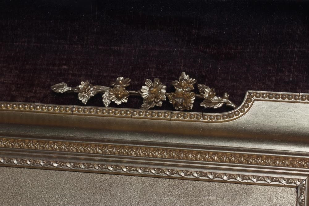 A VICTORIAN GILT GESSO PICTURE FRAME of earred oblong form with pierced scroll surmount hanging Image