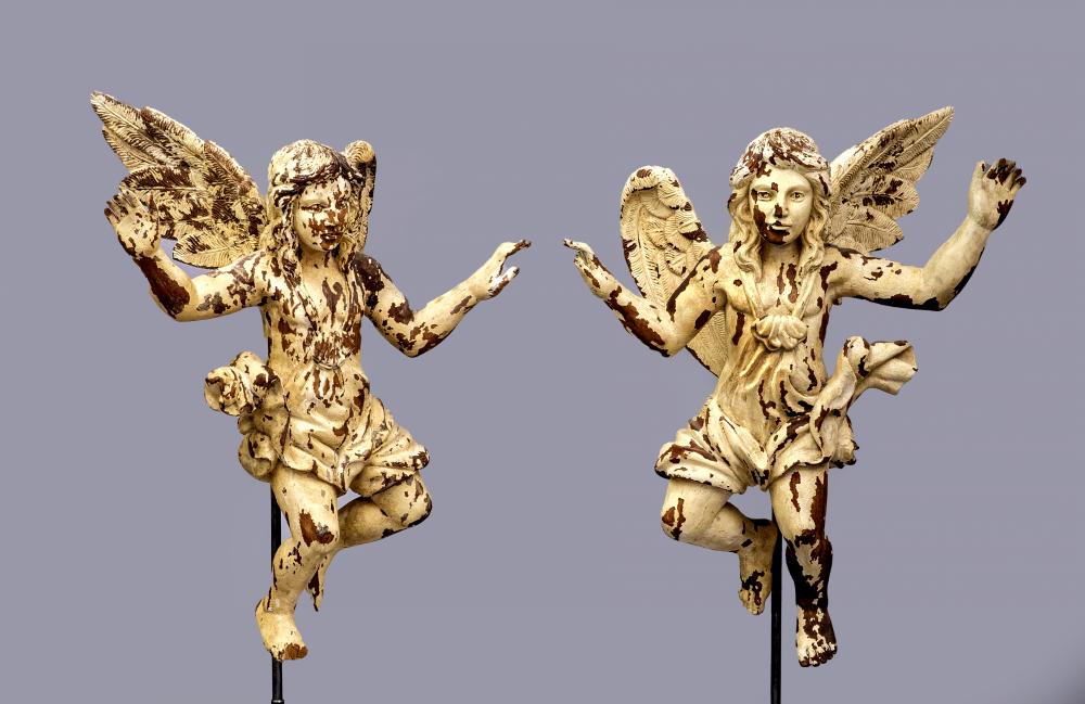 A PAIR OF PAINTED CARVED WOOD ANGELS Image