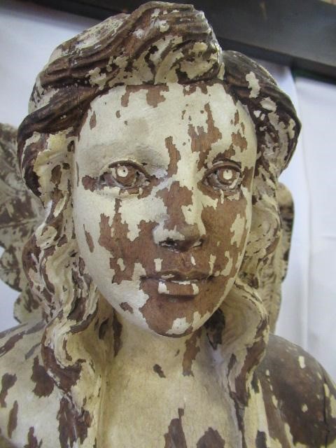 A PAIR OF PAINTED CARVED WOOD ANGELS Image