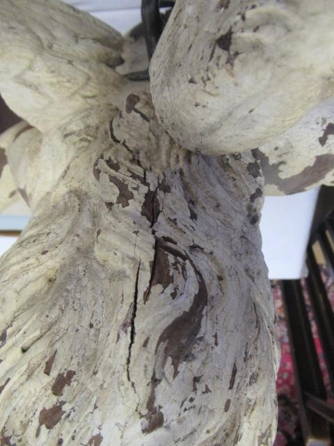 A PAIR OF PAINTED CARVED WOOD ANGELS Image