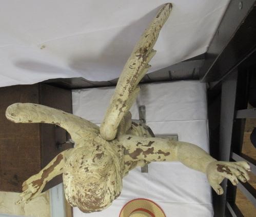 A PAIR OF PAINTED CARVED WOOD ANGELS Image